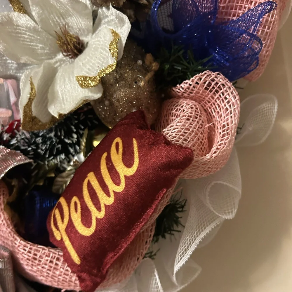 Festive Holiday Wreath with Pink and Gold Accents